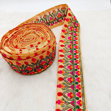 Peach Fabric Trim With Green, Fuchsia Pink, Red And Orange Embroidery and Gold Sequins